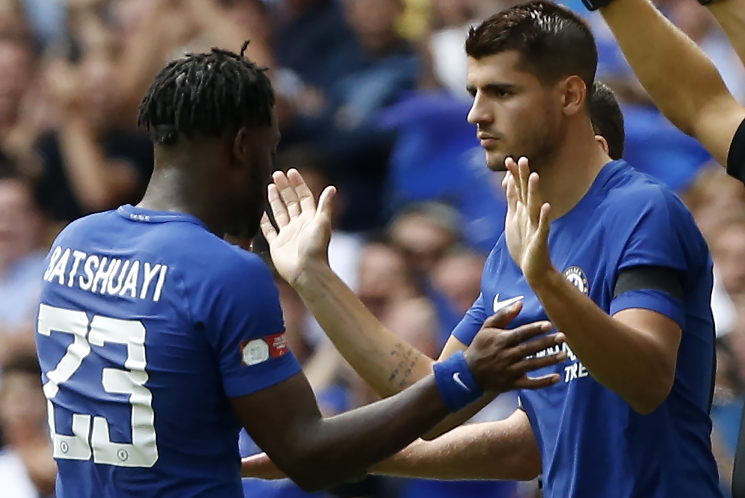 Chelsea's Alvaro Morata (R) comes on as substitute for Chelsea's Belgian striker Michy Batshuayi during the English FA Community Shield football match between Arsenal and Chelsea at Wembley Stadium in north London on August 6, 2017. / AFP PHOTO / Ian KING