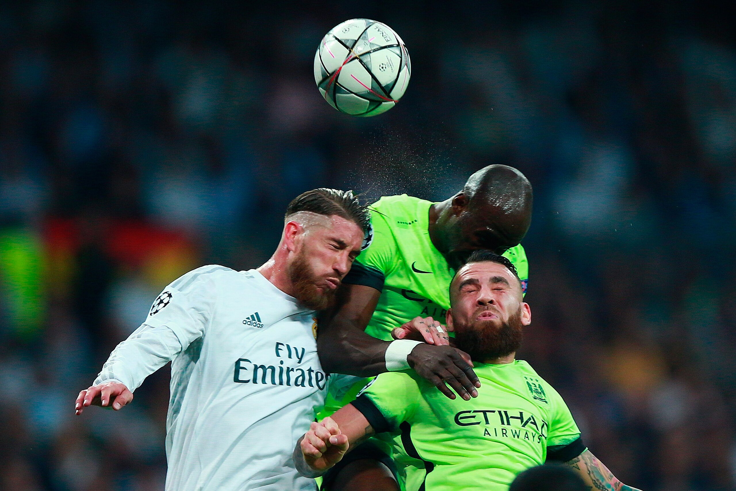 MADRID, SPAIN - MAY 04: Sergio Ramos of Real Madrid, Nicolas Otamendi of Manchester City and Eliaquim Mangala of Manchester City battle to win a header during the UEFA Champions League semi final, second leg match between Real Madrid and Manchester City F