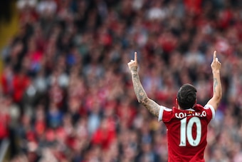 LIVERPOOL, ENGLAND - MAY 21: Philippe Coutinho of Liverpool celebrates after scoring a goal to make it 2-0 during the Premier League match between Liverpool and Middlesbrough at Anfield on May 21, 2017 in Liverpool, England. (Photo by Robbie Jay Barratt -