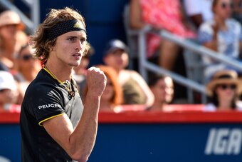 MONTREAL, QC - AUGUST 13:  Alexander Zverev of Germany reacts after scoring a point against Roger Federer of Switzerland during day ten of the Rogers Cup presented by National Bank at Uniprix Stadium on August 13, 2017 in Montreal, Quebec, Canada.  (Photo