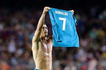 BARCELONA, SPAIN - AUGUST 13: Cristiano Ronaldo of Real Madrid celebrating his score the second of Real Madrid shirtless during the Supercopa de Espana Final 1st Leg match between FC Barcelona and Real Madrid at Camp Nou on August 13, 2017 in Barcelona, S
