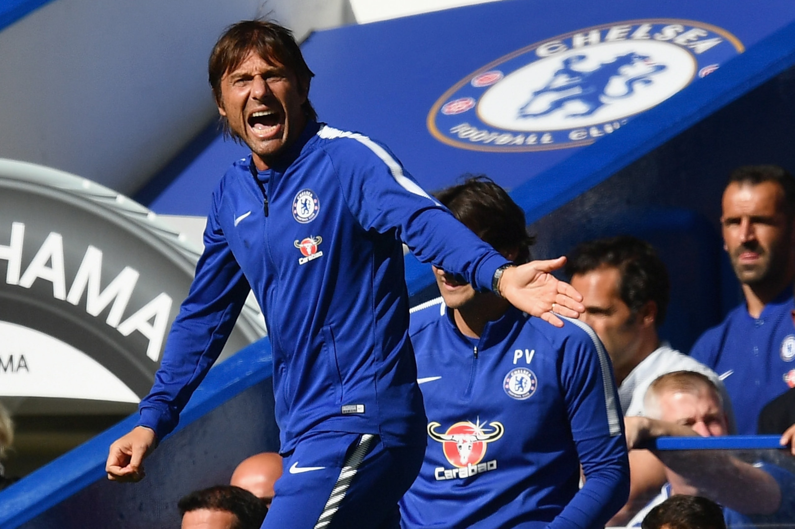 LONDON, ENGLAND - AUGUST 12:  Antonio Conte, Manager of Chelsea gives his team instructions during the Premier League match between Chelsea and Burnley at Stamford Bridge on August 12, 2017 in London, England.  (Photo by Dan Mullan/Getty Images)