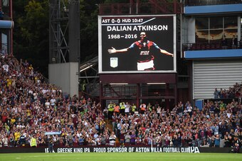 BIRMINGHAM, ENGLAND - AUGUST 16:  A  tribute for Dalian Atkinson is seen on the screen inside the stadium during the Sky Bet Championship match between Aston Villa and Huddersfield Town at Villa Park on August 16, 2016 in Birmingham, England.  (Photo by S