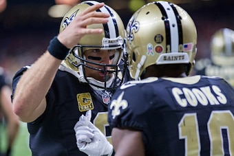 NEW ORLEANS, LA - NOVEMBER 13:  Drew Brees #9 congratulates Brandin Cooks #10 of the New Orleans Saints after catching a touchdown pass during a game against the Denver Broncos at Mercedes-Benz Superdome on November 13, 2016 in New Orleans, Louisiana.  Th