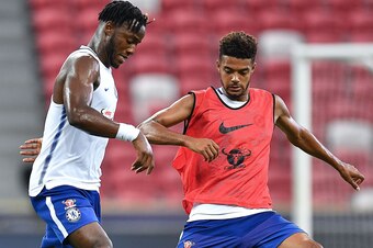 SINGAPORE - JULY 24: Michy Batshuayi and Jake Clarke-Salter of Chelsea FC competes during a Chelsea FC International Champions Cup training session at National Stadium on July 24, 2017 in Singapore.  (Photo by Thananuwat Srirasant/Getty Images  for ICC)