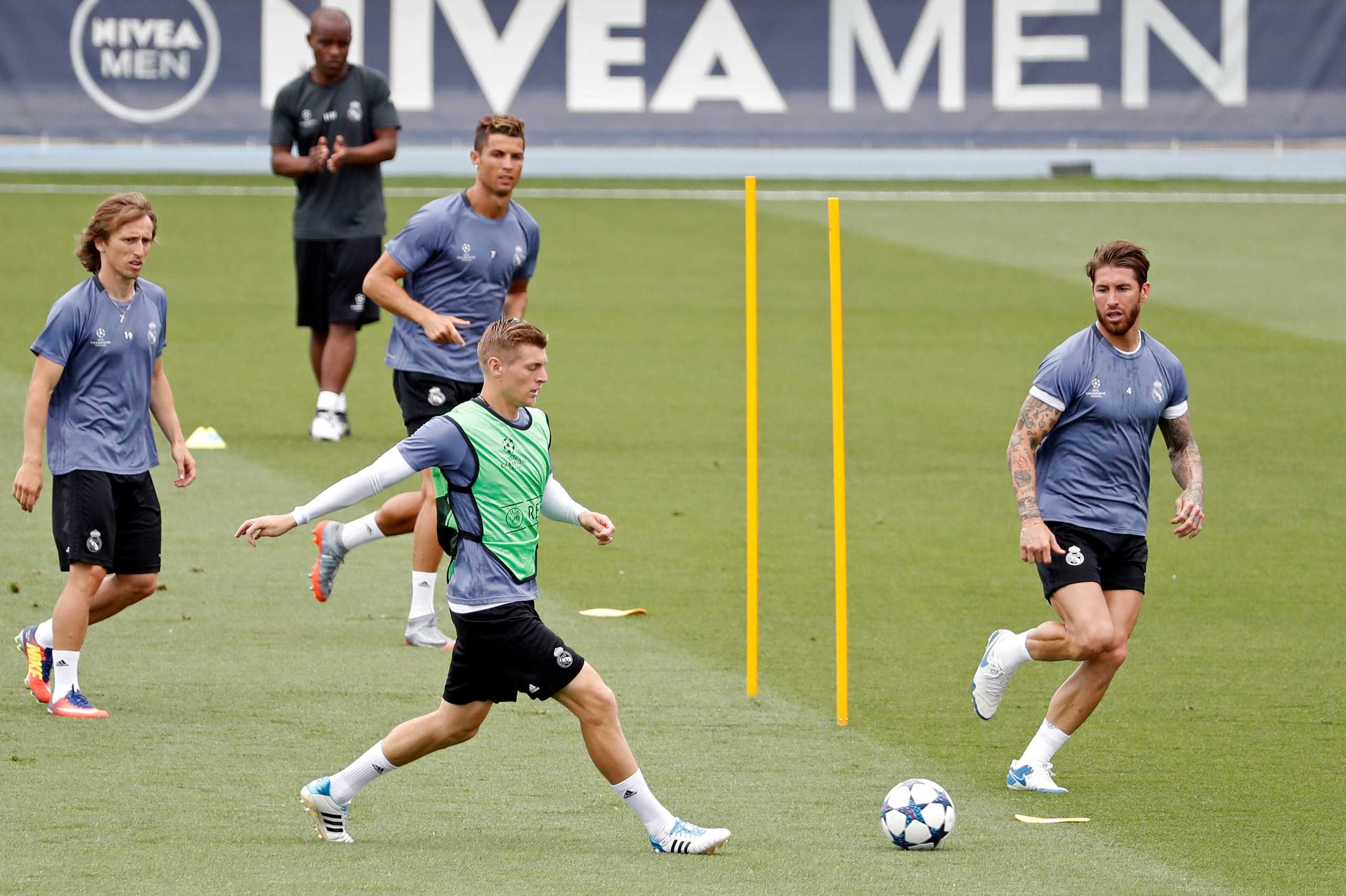 MADRID, SPAIN - MAY 30: Toni Kroos of Real Madrid , Luka Modric of Real Madrid , Cristiano Ronaldo of Real Madrid and Sergio Ramos of Real Madrid in action during training at the Real Madrid UEFA Open Media Day at Valdebebas training ground on May 30, 201