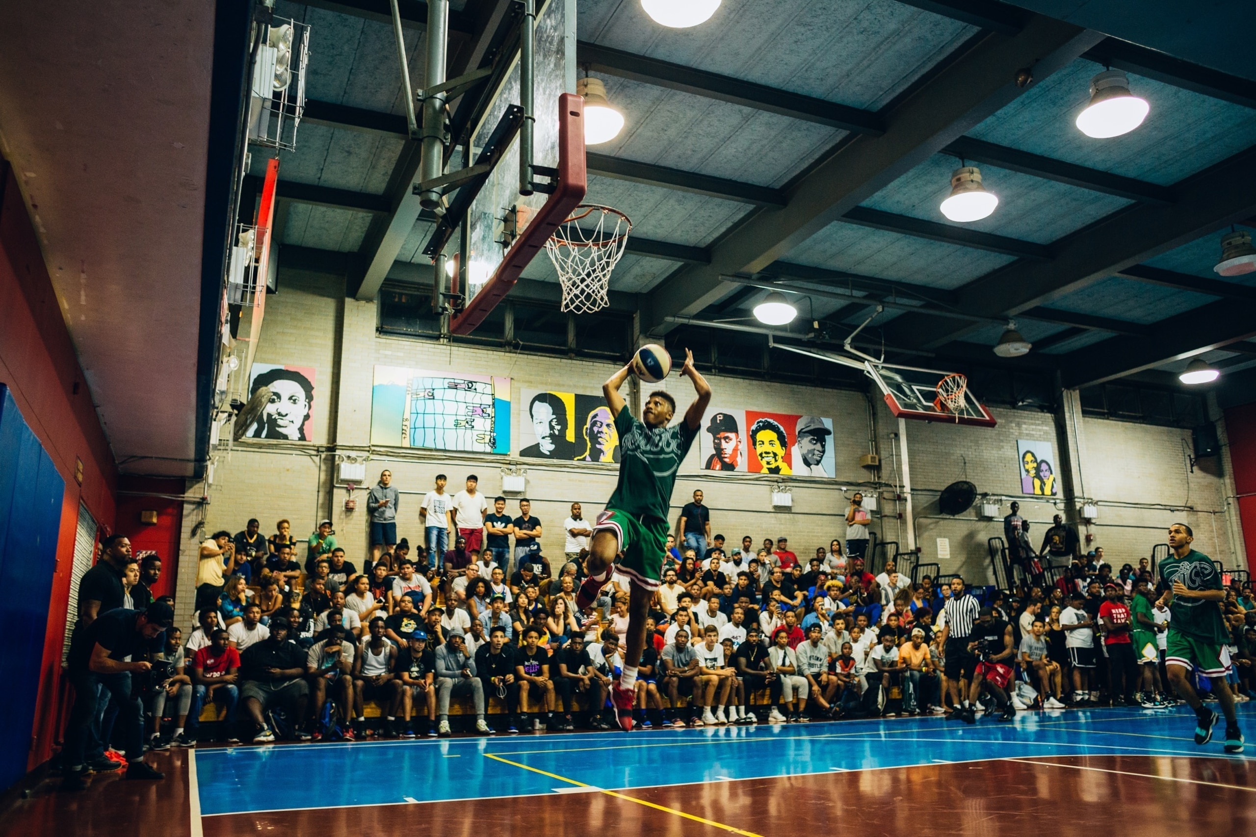 Noah Farrakhan takes off for a dunk.