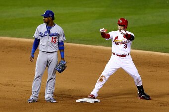 ST LOUIS, MO - OCTOBER 18:  Carlos Beltran #3 of the St. Louis Cardinals celebrates at second  base after he hits a RBI double in the third inning against the Los Angeles Dodgers in Game Six of the National League Championship Series at Busch Stadium on O