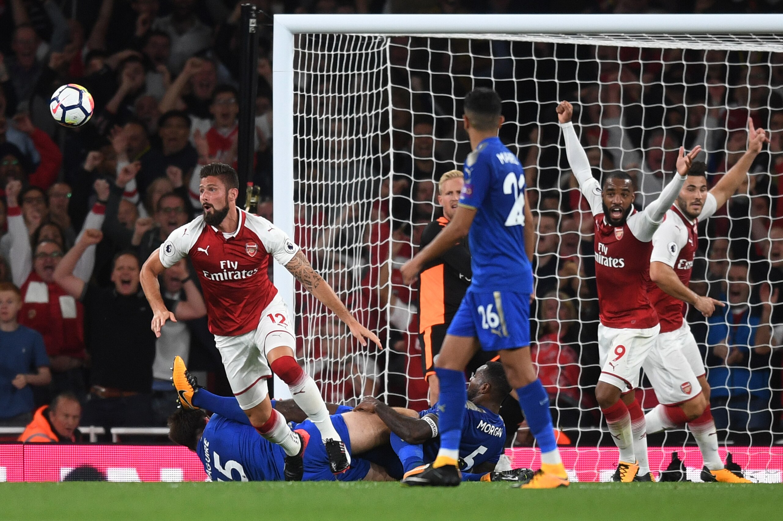 LONDON, ENGLAND - AUGUST 11:  Olivier Giroud of Arsenal celebrates after scoring his team's fourth goal during the Premier League match between Arsenal and Leicester City at the Emirates Stadium on August 11, 2017 in London, England.  (Photo by Michael Re