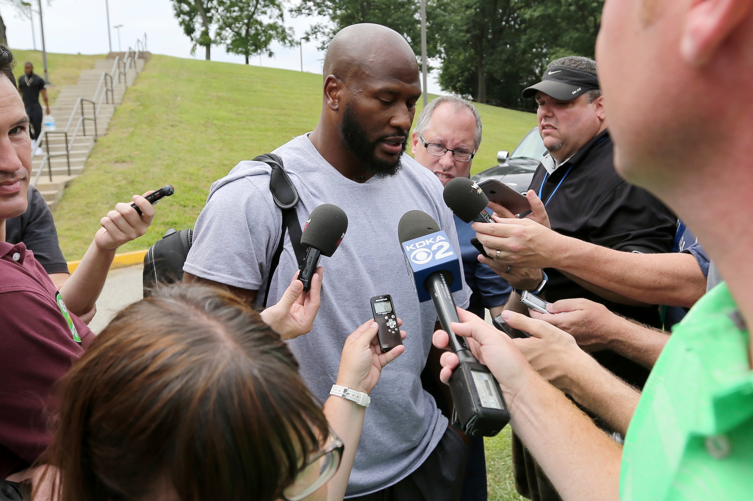 James Harrison at the start of camp. Reporter gaggles like these are rare—and brief. James Harrison at the start of camp. Reporter gaggles like these are rare—and brief.