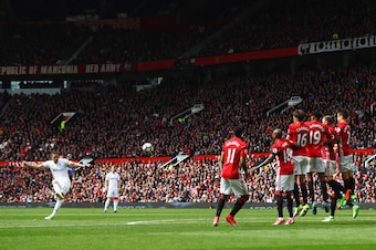 MANCHESTER, ENGLAND - APRIL 30: Gylfi Sigurdsson of Swansea City scores his sides first goal from a freekick during the Premier League match between Manchester United and Swansea City at Old Trafford on April 30, 2017 in Manchester, England.  (Photo by Mi