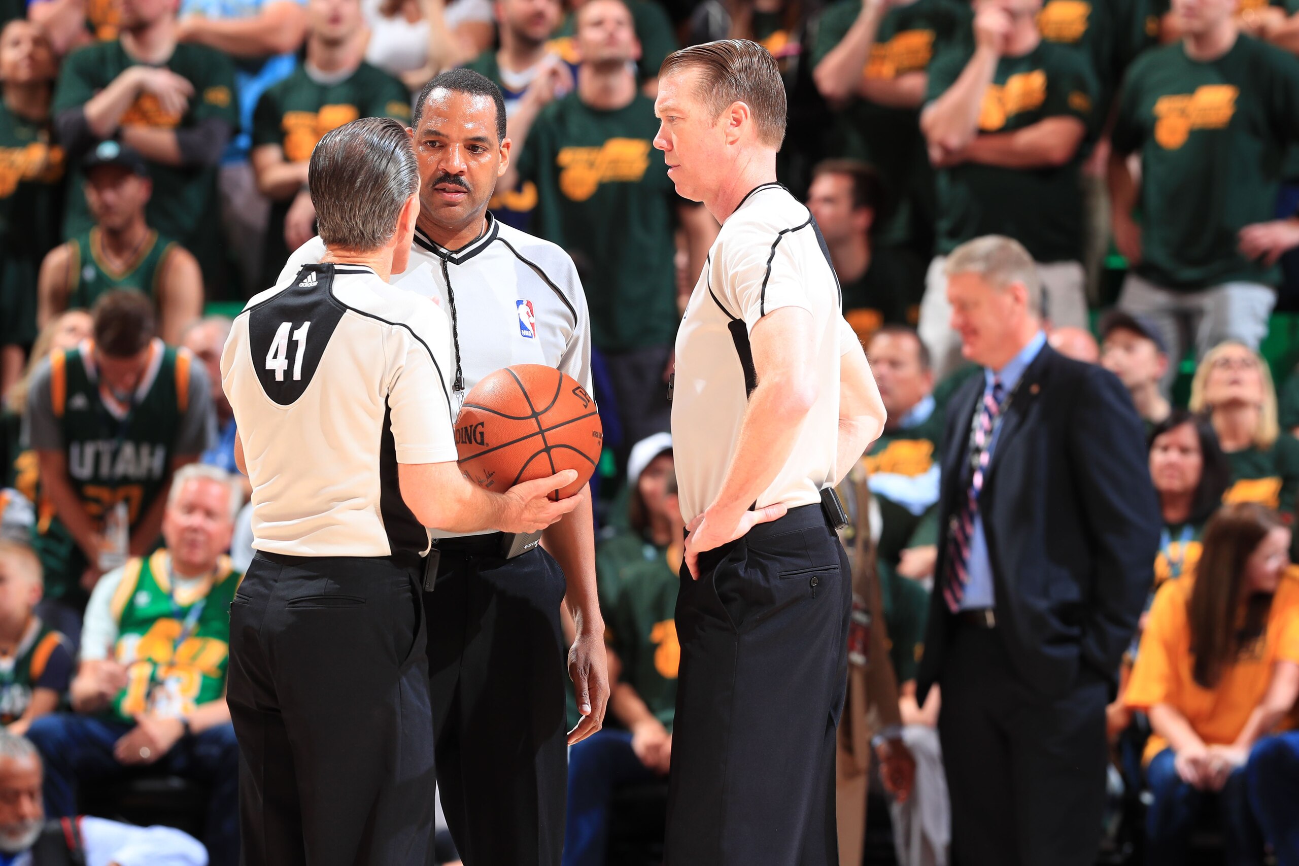 SALT LAKE CITY, UT - MAY 6:  Referees, Ed Malloy, Bennie Adams and Ken Mauer huddle up in Game Three of the Western Conference Semifinals between the Golden State Warriors and the Utah Jazz during the 2017 NBA Playoffs on May 6, 2017 at vivint.SmartHome A