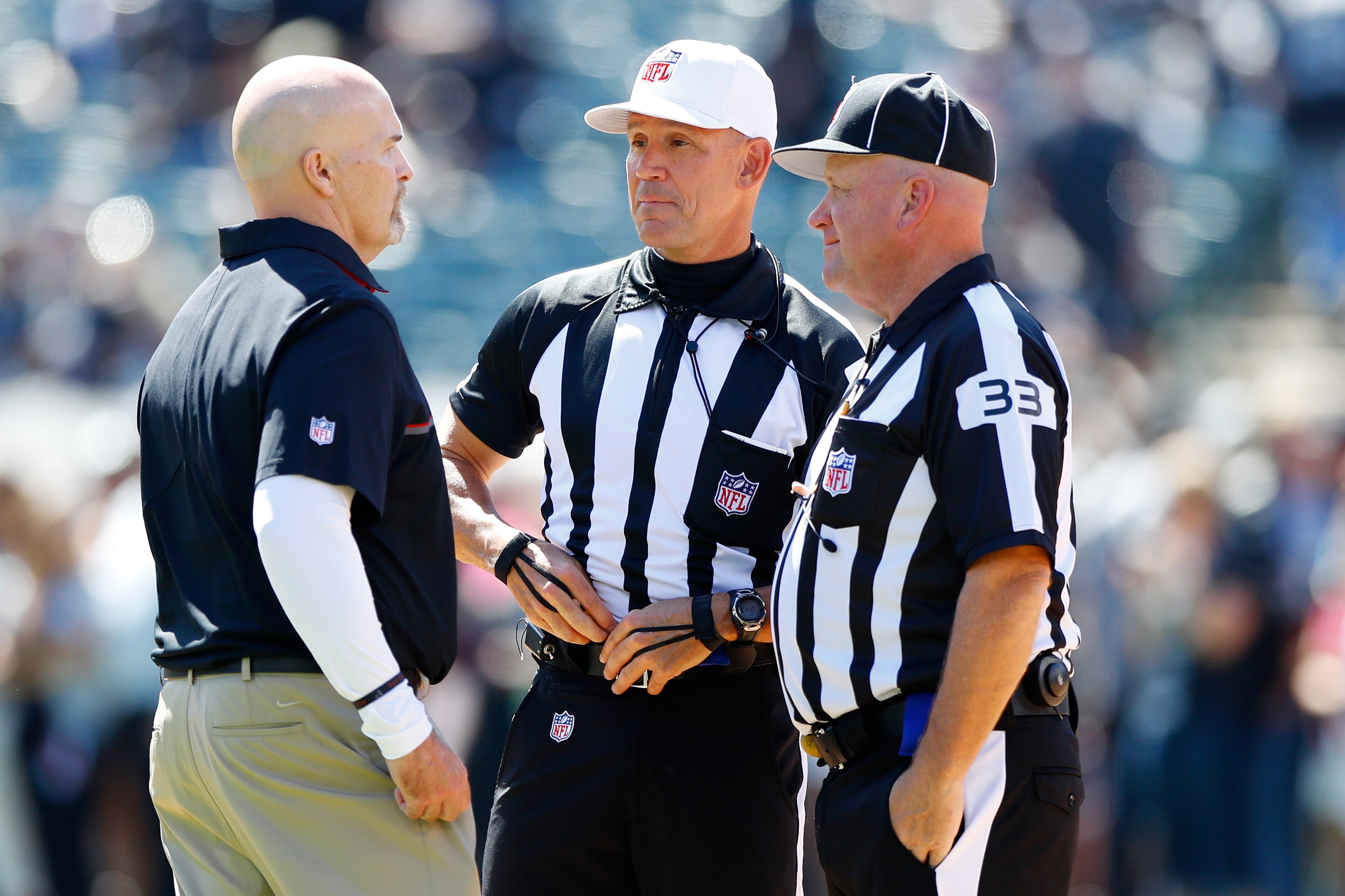 OAKLAND, CA - SEPTEMBER 18: Head coach Dan Quinn of the Atlanta Falcons speaks with referee Clete Blakeman and field judge Steve Zimmer prior to their NFL game against the Oakland Raiders at Oakland-Alameda County Coliseum on September 18, 2016 in Oakla OAKLAND, CA - SEPTEMBER 18: Head coach Dan Quinn of the Atlanta Falcons speaks with referee Clete Blakeman and field judge Steve Zimmer prior to their NFL game against the Oakland Raiders at Oakland-Alameda County Coliseum on September 18, 2016 in Oakla
