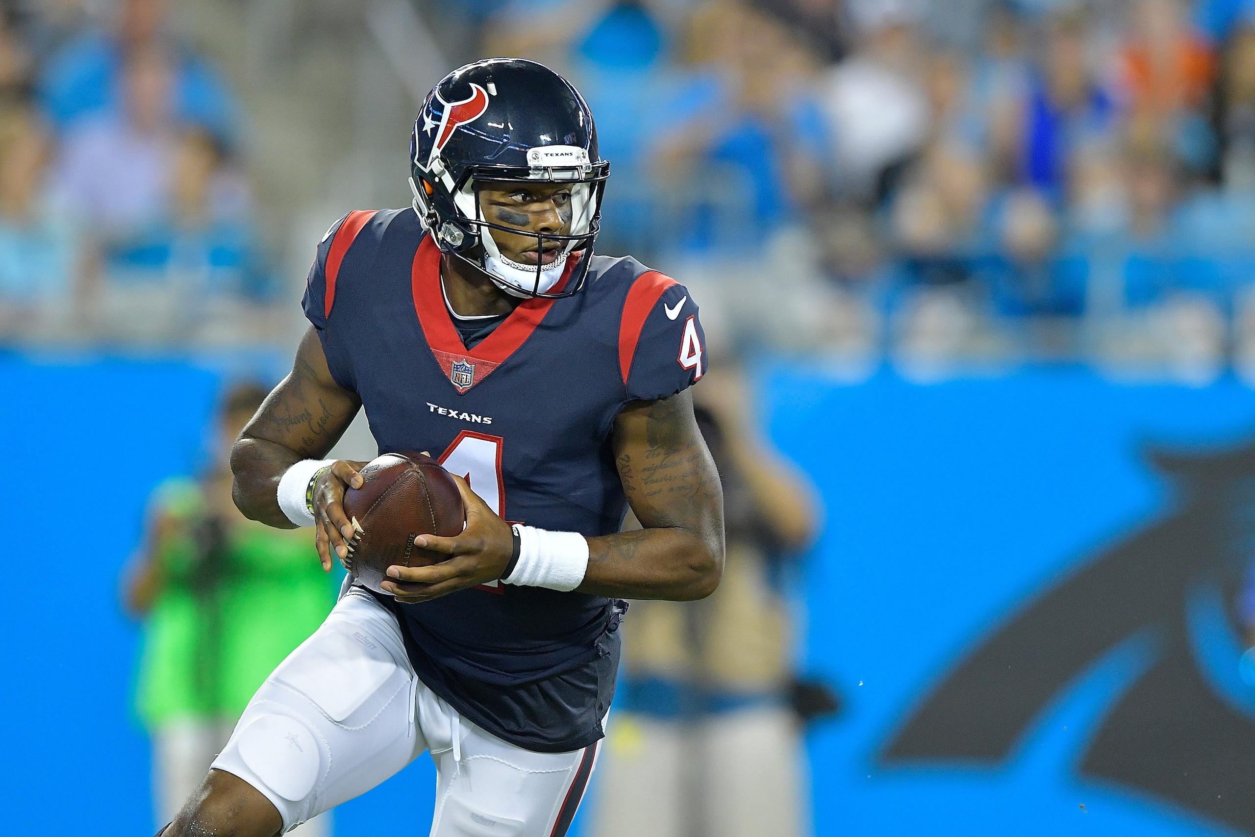 CHARLOTTE, NC - AUGUST 09:  Deshaun Watson #4 of the Houston Texans  against the Carolina Panthers during their game at Bank of America Stadium on August 9, 2017 in Charlotte, North Carolina.  (Photo by Grant Halverson/Getty Images)