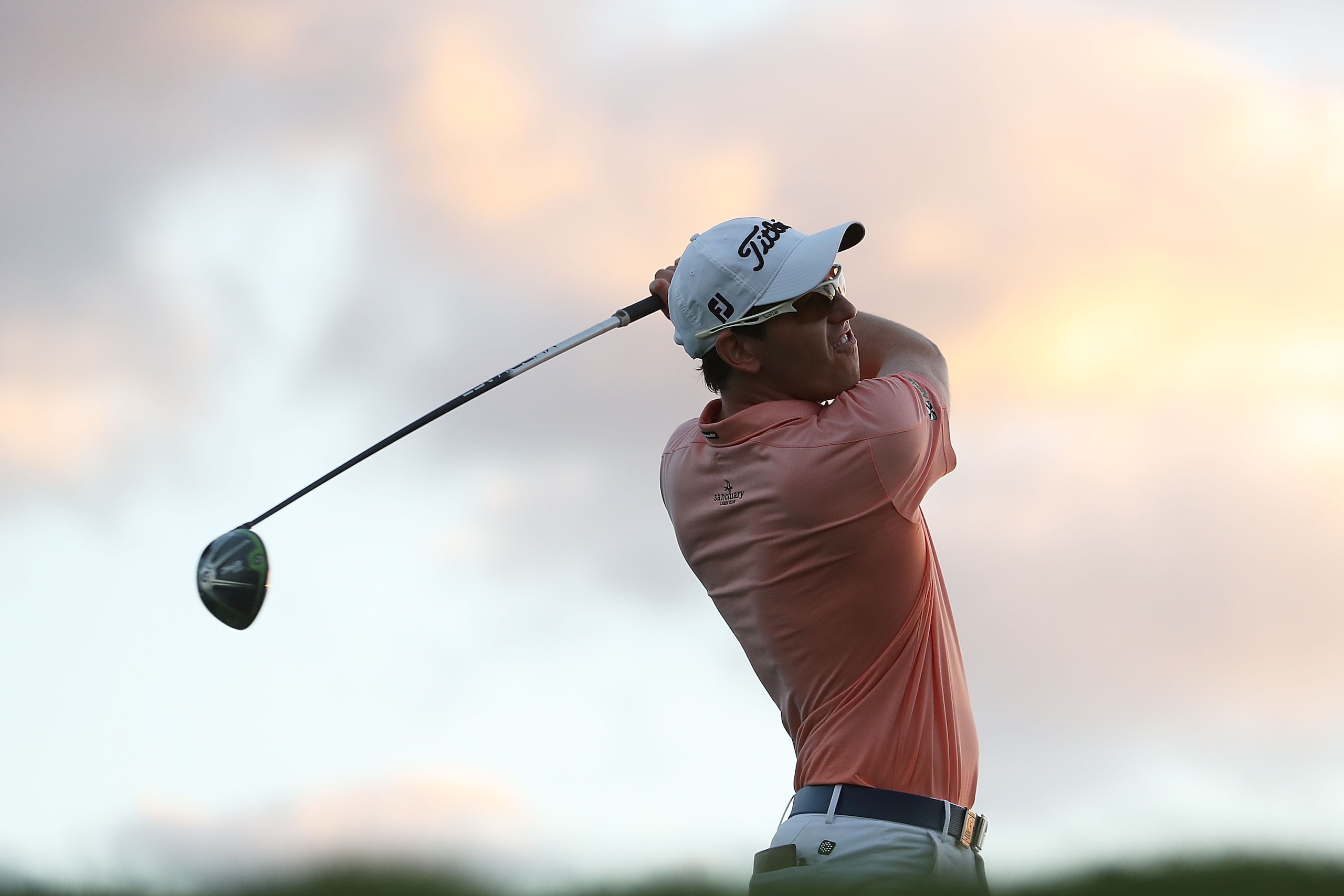 SUVA, FIJI - AUGUST 17:  Daniel Valente of Australia hits his tee shot on the 9th hole during day one of the 2017 Fiji International at Natadola Bay Championship Golf Course on August 17, 2017 in Suva, Fiji.  (Photo by Mark Metcalfe/Getty Images)