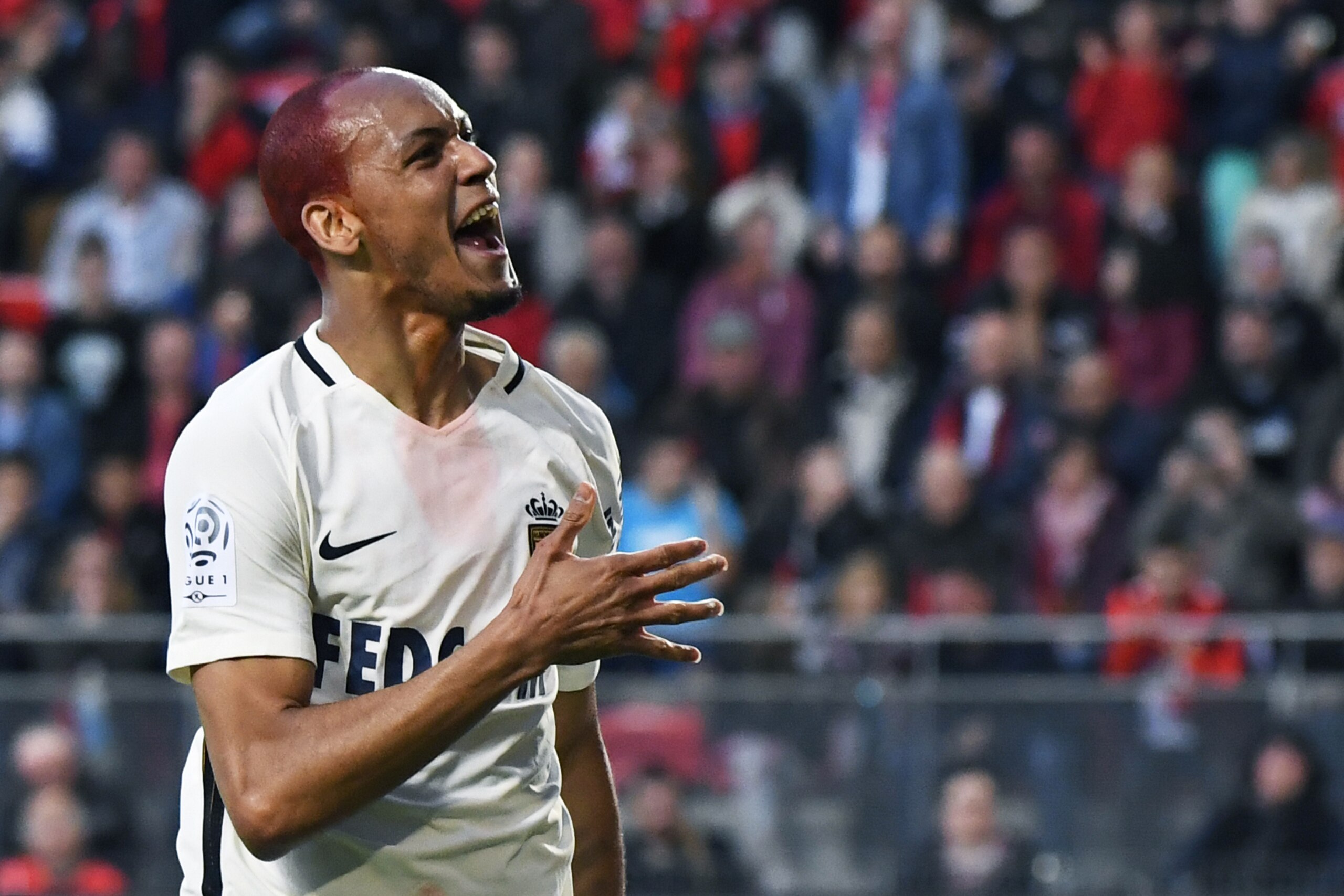 Monaco's Brazilian defender Fabinho celebrates after scoring a goal during the French L1 football match between Rennes (SRFC) and Monaco (ASM) on May, 20 2017, at the Roazhon Park stadium in Rennes, western France. / AFP PHOTO / DAMIEN MEYER        (Photo