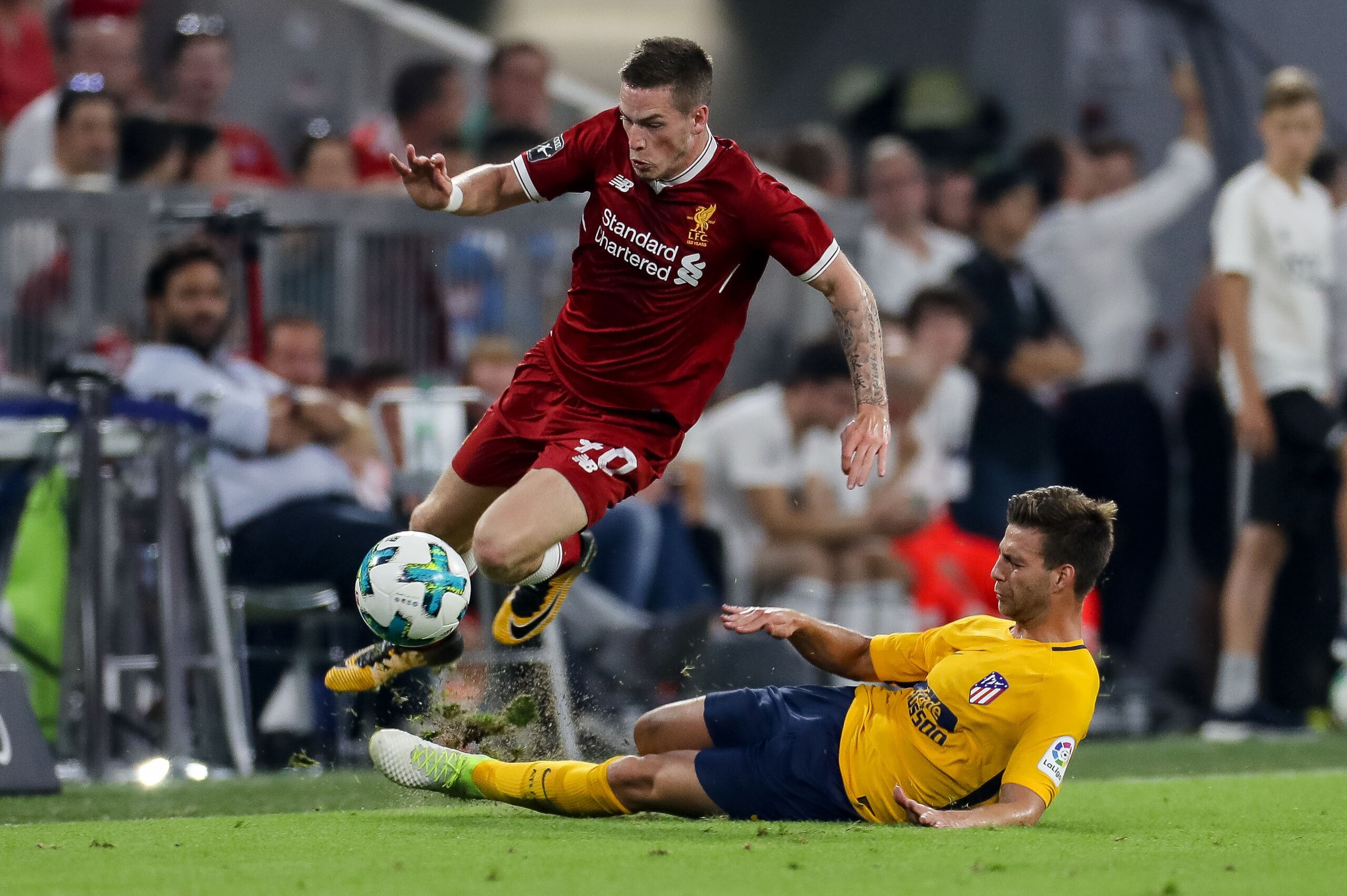 MUNICH, GERMANY - AUGUST 02: Ryan Kent of Liverpool and Sergi of Atletico Madrid battle for the ball during the Audi Cup 2017 match between Liverpool FC and Atletico Madrid at Allianz Arena on August 2, 2017 in Munich, Germany. (Photo by TF-Images/TF-Imag