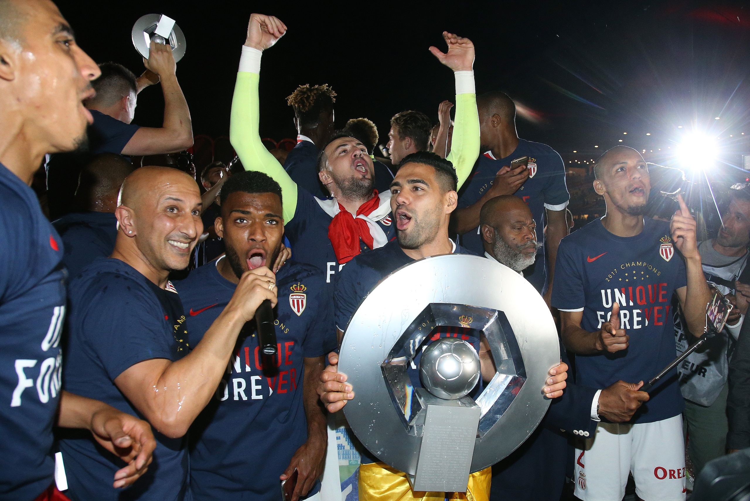 MONACO, MONACO - MAY 17: Thomas Lemar, goalkeeper of Monaco Danijel Subasic, Radamel Falcao of Monaco holding the trophy, Fabio Henrique Tavares aka Fabinho during the French League 1 Championship title celebration following the French Ligue 1 match betwe