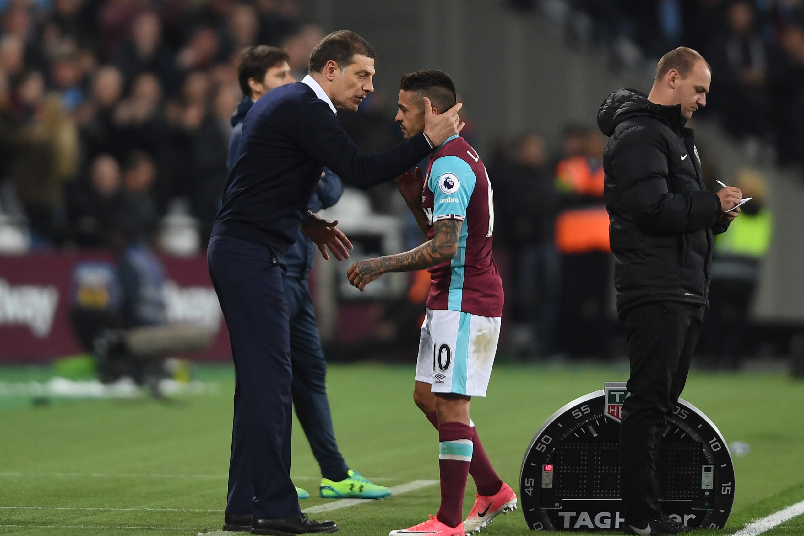 STRATFORD, ENGLAND - MAY 05: Goalscorer Manuel Lanzini of West Ham United is congratulated by Slaven Bilic, Manager of West Ham United, as he is substituted during the Premier League match between West Ham United and Tottenham Hotspur at the London Stadi STRATFORD, ENGLAND - MAY 05: Goalscorer Manuel Lanzini of West Ham United is congratulated by Slaven Bilic, Manager of West Ham United, as he is substituted during the Premier League match between West Ham United and Tottenham Hotspur at the London Stadi
