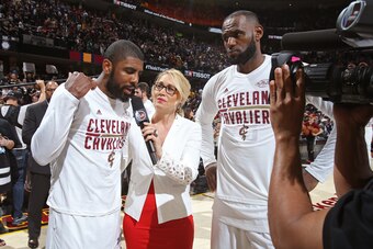CLEVELAND, OH - JUNE 09:  NBA TNT Reporter, Doris Burke interviews Kyrie Irving #2 and LeBron James #23 of the Cleveland Cavaliers after Game Four of the 2017 NBA Finals against the Golden State Warriors on June 9, 2017 at Quicken Loans Arena in Cleveland