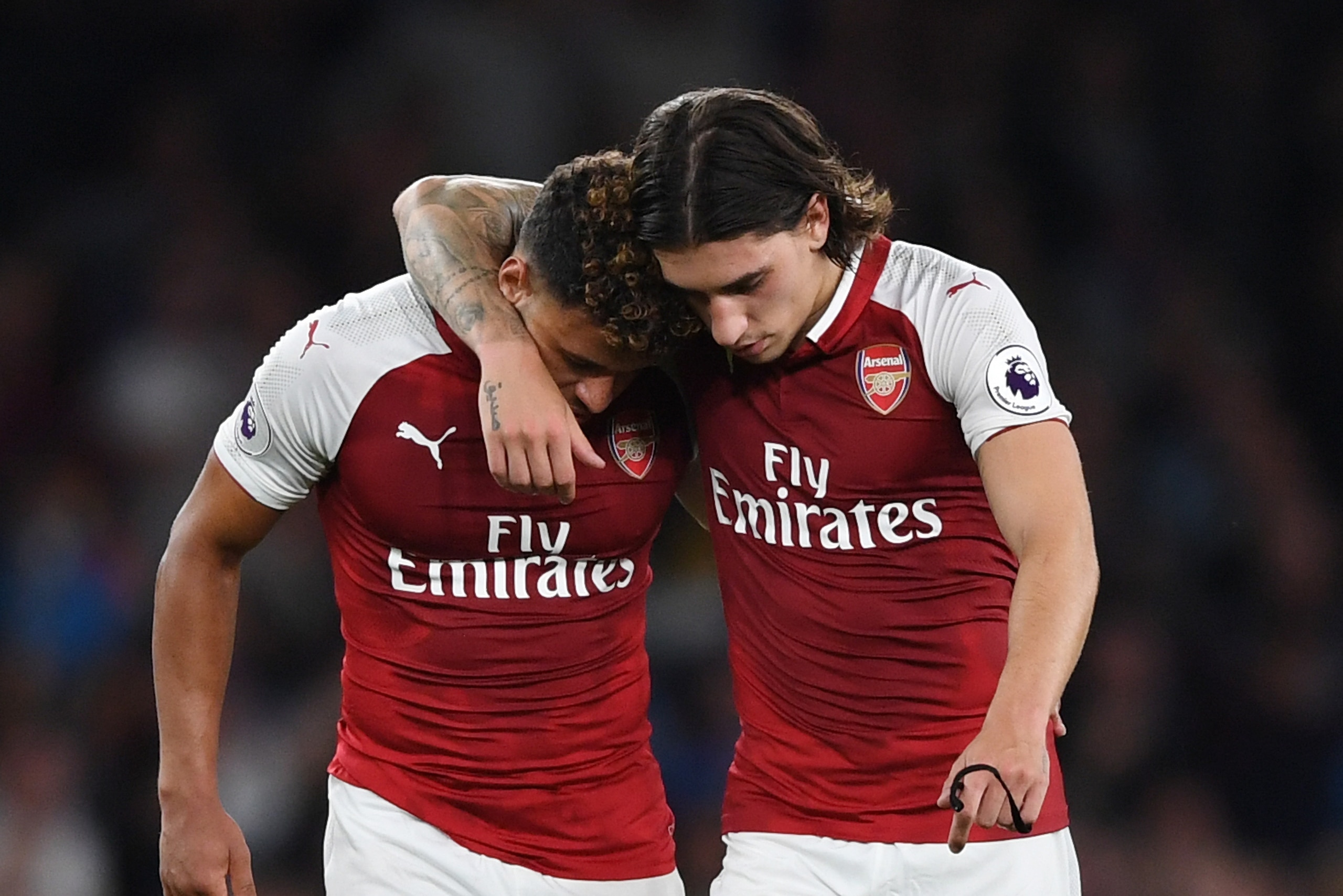 LONDON, ENGLAND - AUGUST 11:  Teammates Alex Oxlade-Chamberlain and Hector Bellerin of Arsenal celebrate following their team's 4-3 victory during the Premier League match between Arsenal and Leicester City at the Emirates Stadium on August 11, 2017 in Lo
