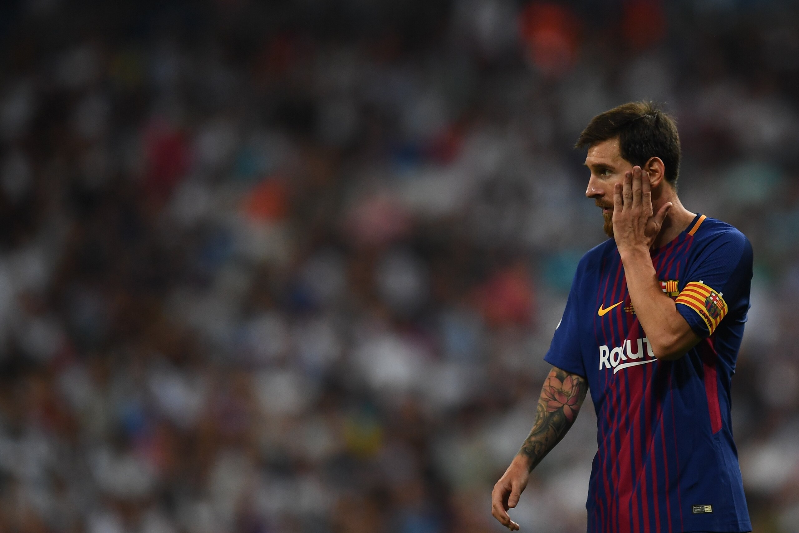 Barcelona's Argentinian forward Lionel Messi gestures during the second leg of the Spanish Supercup football match Real Madrid vs FC Barcelona at the Santiago Bernabeu stadium in Madrid, on August 16, 2017. / AFP PHOTO / GABRIEL BOUYS        (Photo credit