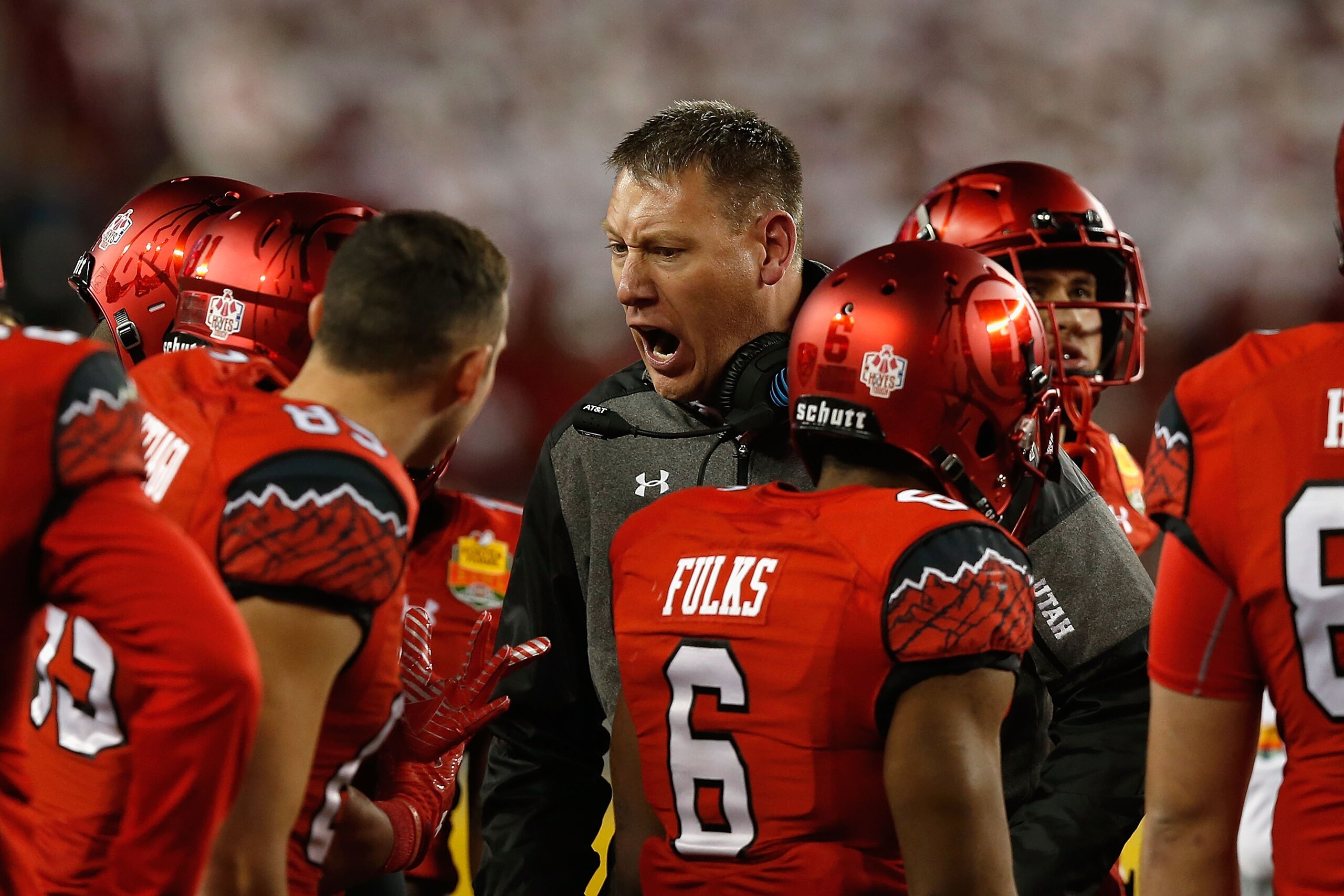 SANTA CLARA, CA - DECEMBER 28: Utah Utes offensive coordinator Jim Harding addresses his players during the Foster Farms Bowl game at Levi's Stadium on December 28, 2016 in Santa Clara, California. (Photo by Lachlan Cunningham/Getty Images)
