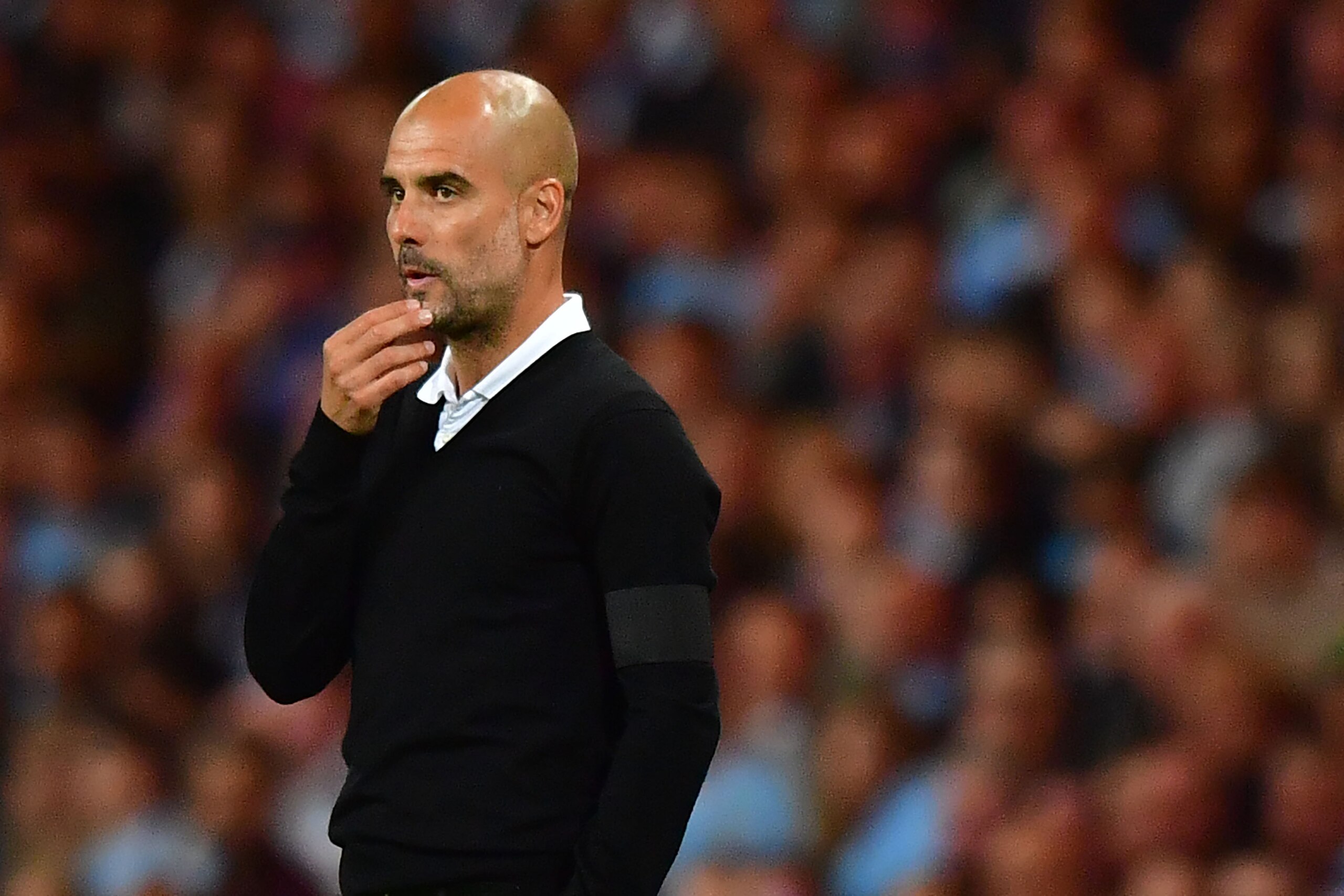 Manchester City's Spanish manager Pep Guardiola  gestures during the English Premier League football match between Manchester City and Everton at the Etihad Stadium in Manchester, north west England, on August 21, 2017. / AFP PHOTO / Anthony DEVLIN / REST