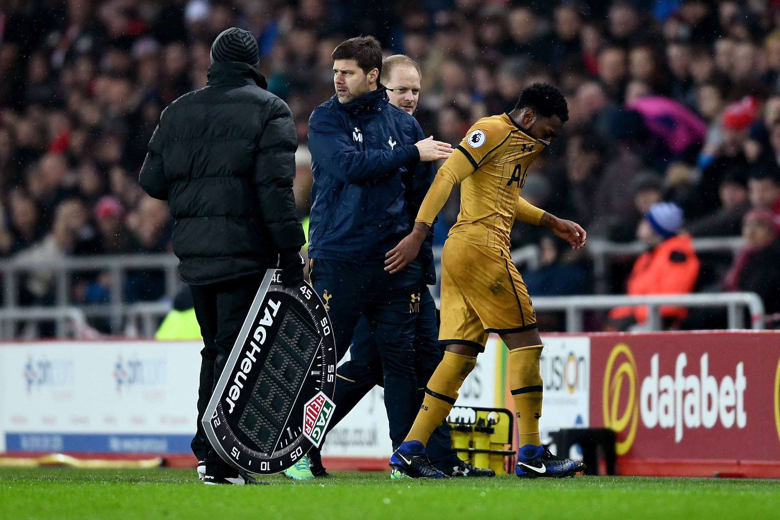 SUNDERLAND, ENGLAND - JANUARY 31:  Danny Rose of Tottenham Hotspur is consoled by Mauricio Pochettino, Manager of Tottenham Hotspur as he leaves the field injured during the Premier League match between Sunderland and Tottenham Hotspur at Stadium of Light