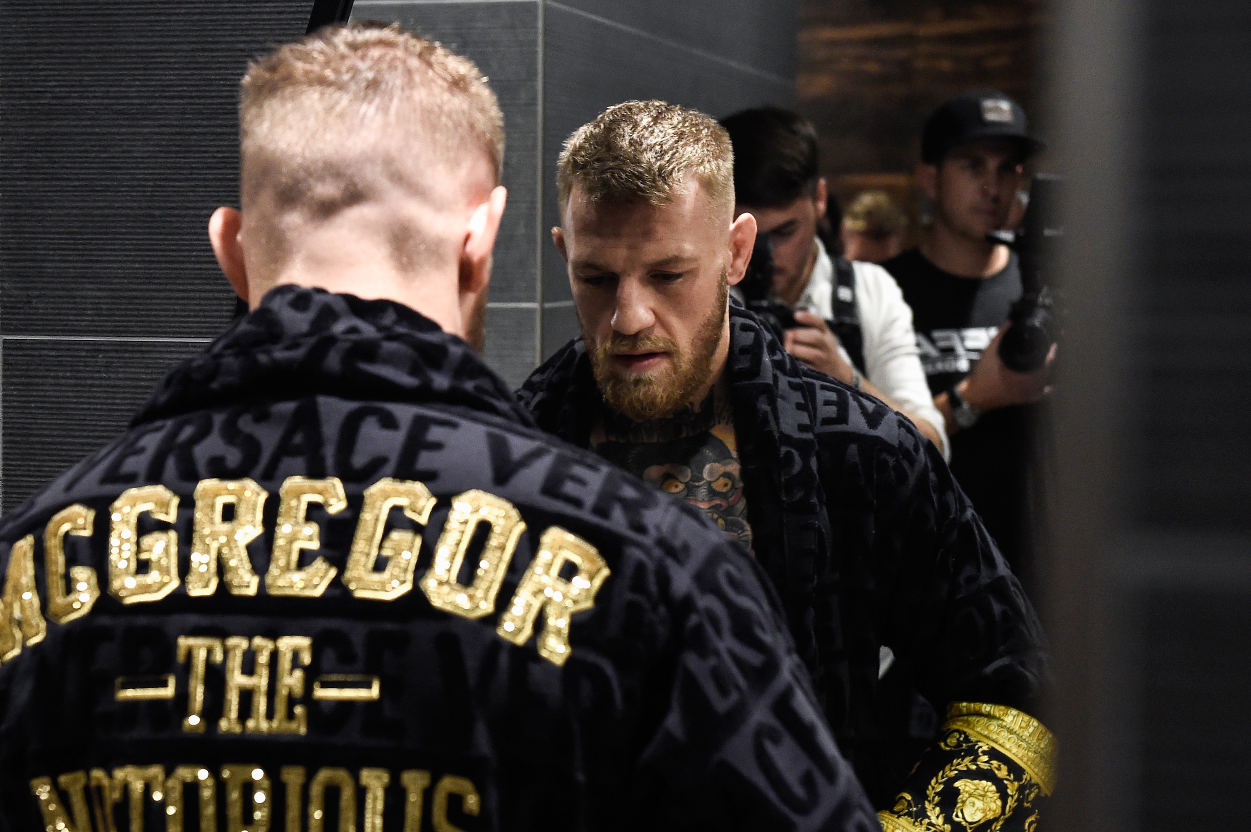 LAS VEGAS, NV - AUGUST 11:  UFC lightweight champion Conor McGregor changes in the locker room before the media workout at the UFC Performance Institute on August 11, 2017 in Las Vegas, Nevada. McGregor will fight Floyd Mayweather Jr. in a boxing match at