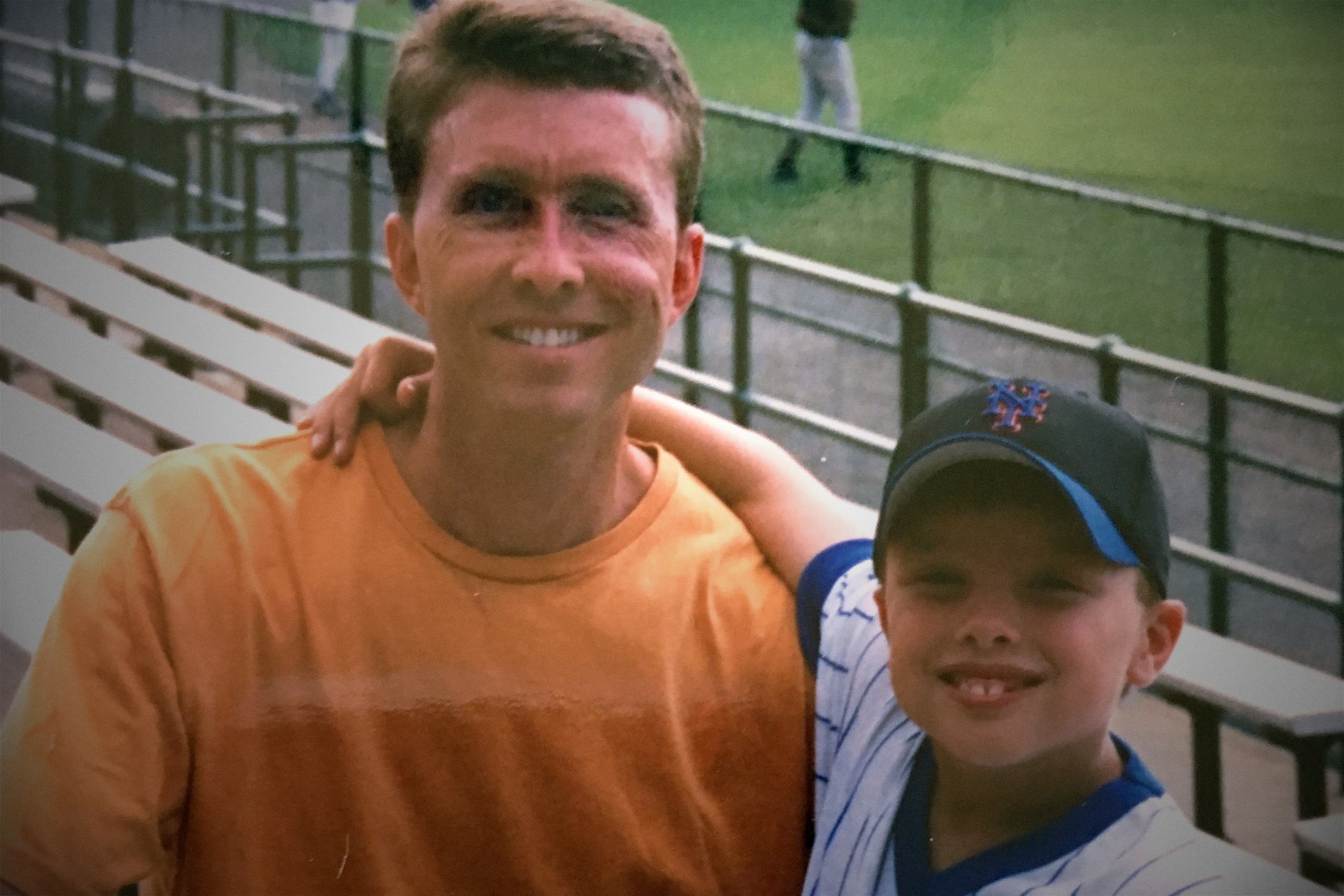 Tom (left) poses with his son. He still can't let go. Tom (left) poses with his son. He still can't let go.
