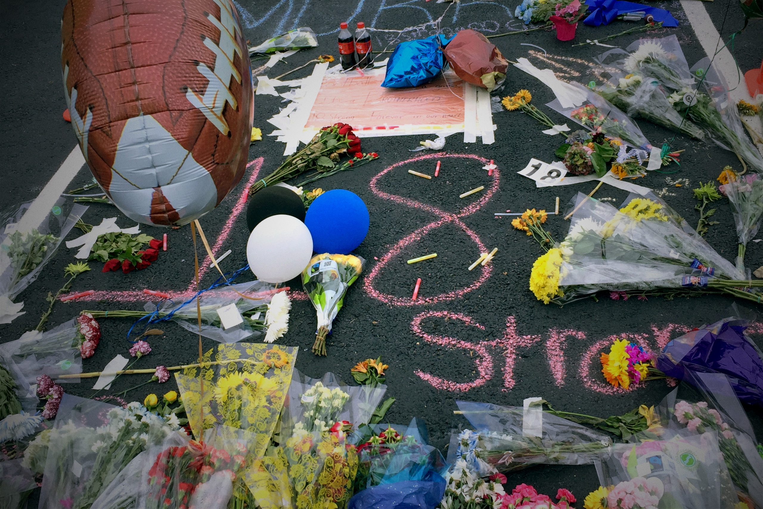 Evan's friends created a makeshift memorial in his assigned school parking lot space after learning of his death. Evan's friends created a makeshift memorial in his assigned school parking lot space after learning of his death.
