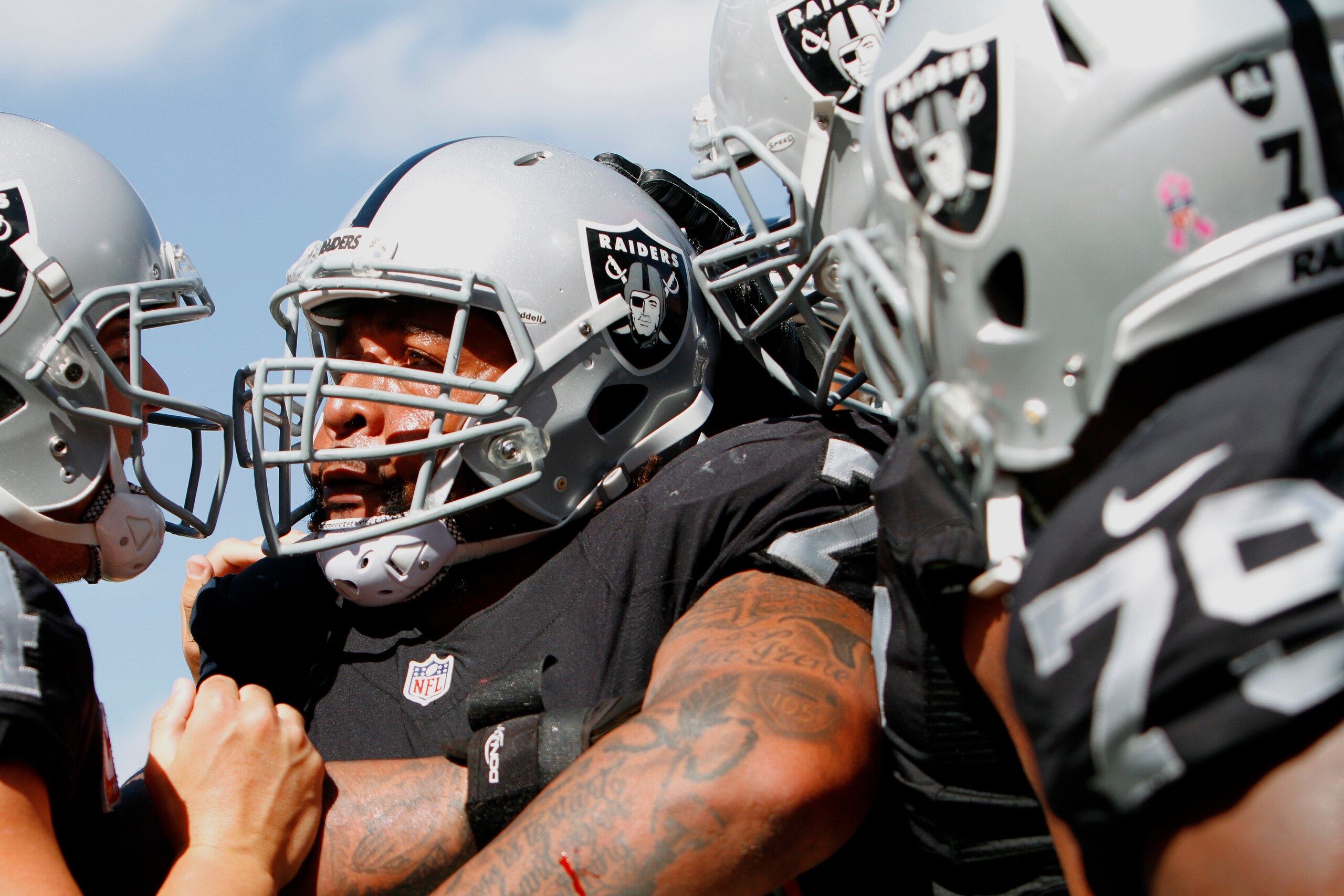 TAMPA, FL - OCTOBER 30: Tackle Donald Penn #72 of the Oakland Raiders is congratulated by teammates after catching a touchdown pass in the third quarter against the Tampa Bay Buccaneers to tie the game at 10-10 at Raymond James Stadium on October 30, 2016