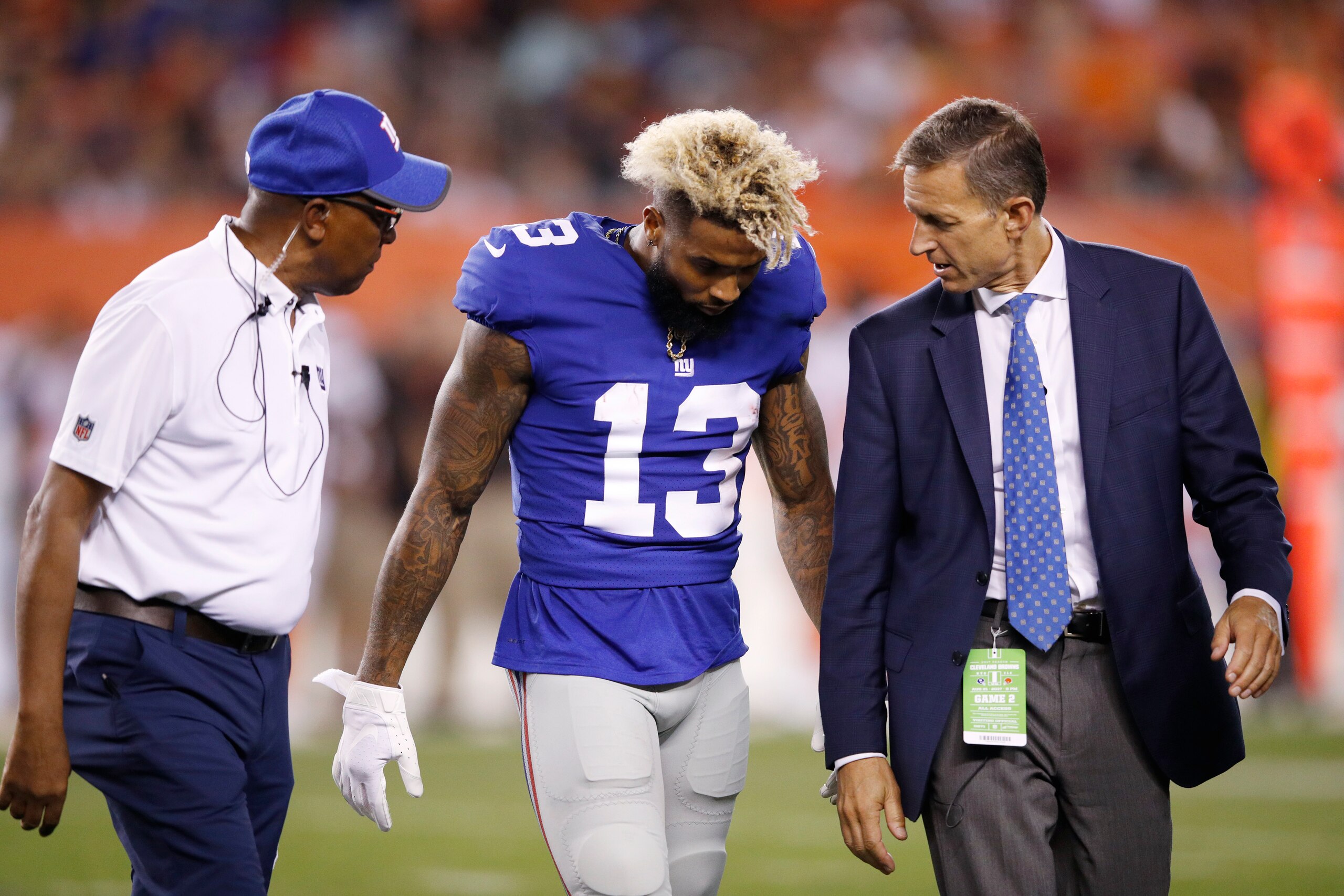 CLEVELAND, OH - AUGUST 21: Odell Beckham Jr. #13 of the New York Giants walks off the field after suffering an injury in the first half of a preseason game against the Cleveland Browns at FirstEnergy Stadium on August 21, 2017 in Cleveland, Ohio. (Photo b