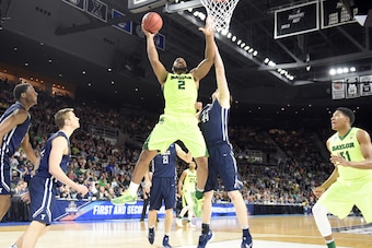 PROVIDENCE, RI - MARCH 17:  Rico Gathers #2 of the Baylor Bears drives to the basket during a first round NCAA College Basketball Tournament game against the Yale Bulldogs at Dunkin' Donuts Center on March 17, 2016 in Providence, Rhode Island.  The Bulldo