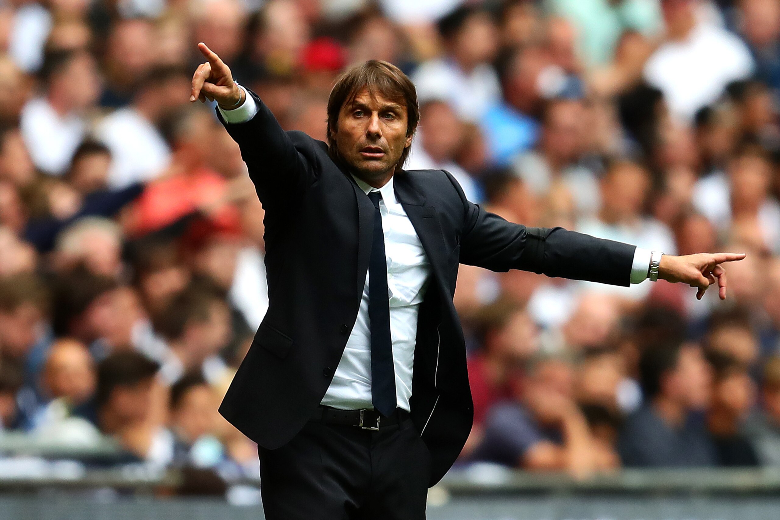 LONDON, ENGLAND - AUGUST 20: Chelsea manager Antonio Conte gestures from the touchline during the Premier League match between Tottenham Hotspur and Chelsea at Wembley Stadium on August 20, 2017 in London, England. (Photo by Chris Brunskill Ltd/Getty Imag
