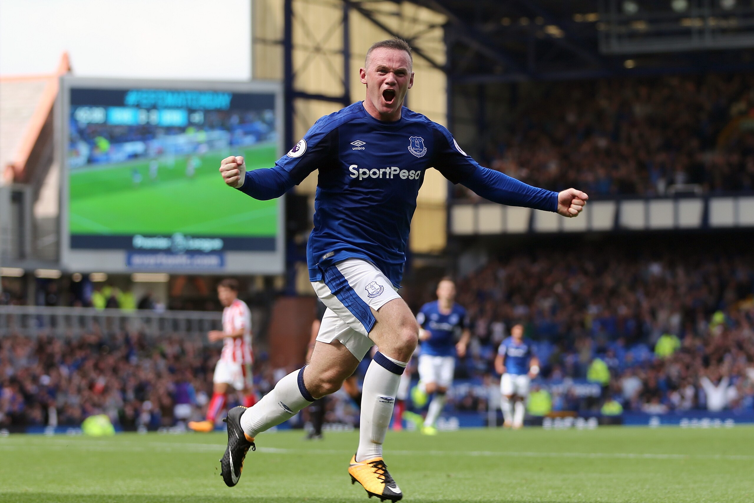 LIVERPOOL, ENGLAND - AUGUST 12: Wayne Rooney of Everton celebrates after scoring a goal to make it 1-0 during the Premier League match between Everton and Stoke City at Goodison Park on August 12, 2017 in Liverpool, England. (Photo by James Baylis - AMA/G