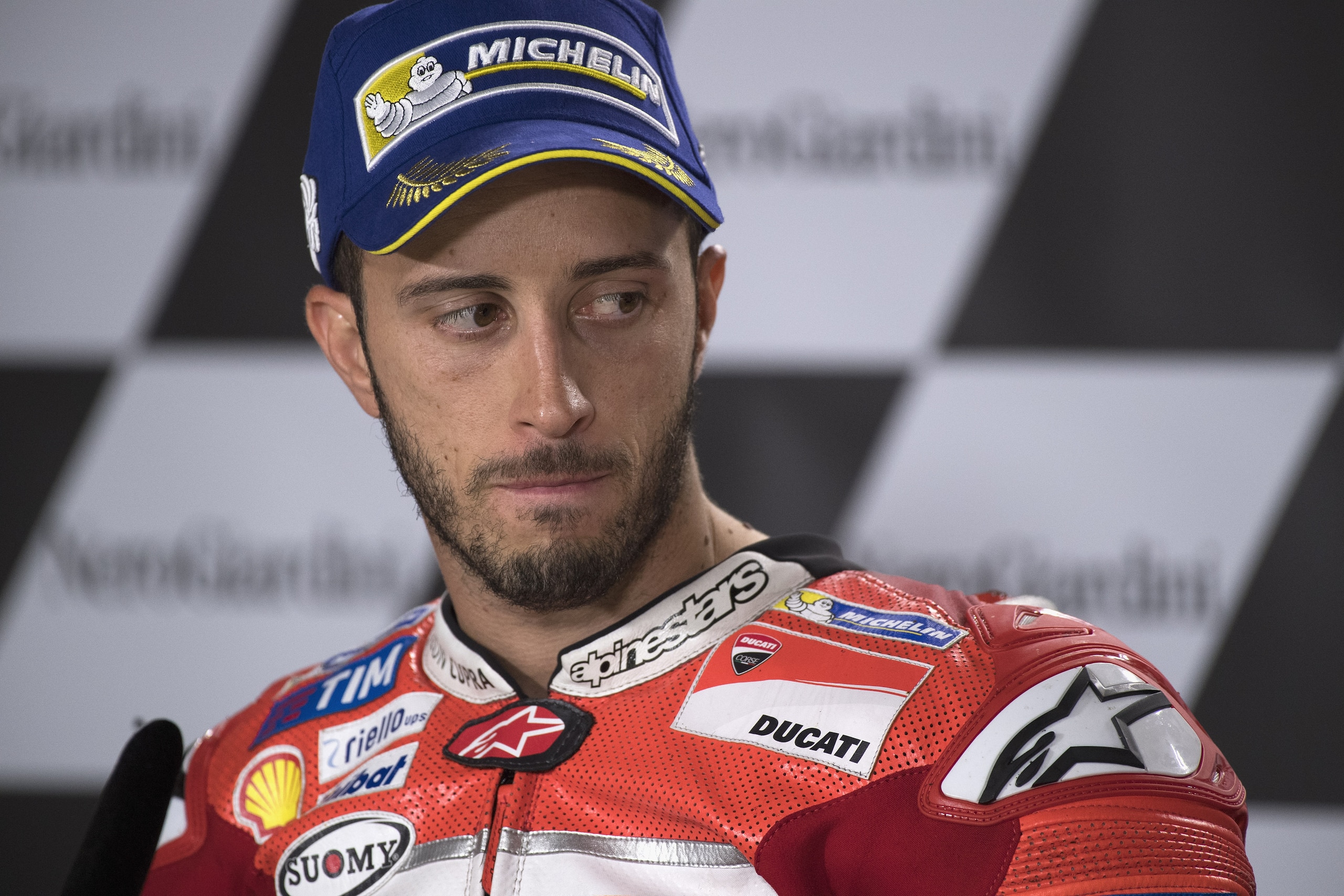 SPIELBERG, AUSTRIA - AUGUST 13: Andrea Dovizioso of Italy and Ducati Team looks on during the press conference at the end of the MotoGP race during the MotoGp of Austria - Race at Red Bull Ring on August 13, 2017 in Spielberg, Austria.  (Photo by Mirco La
