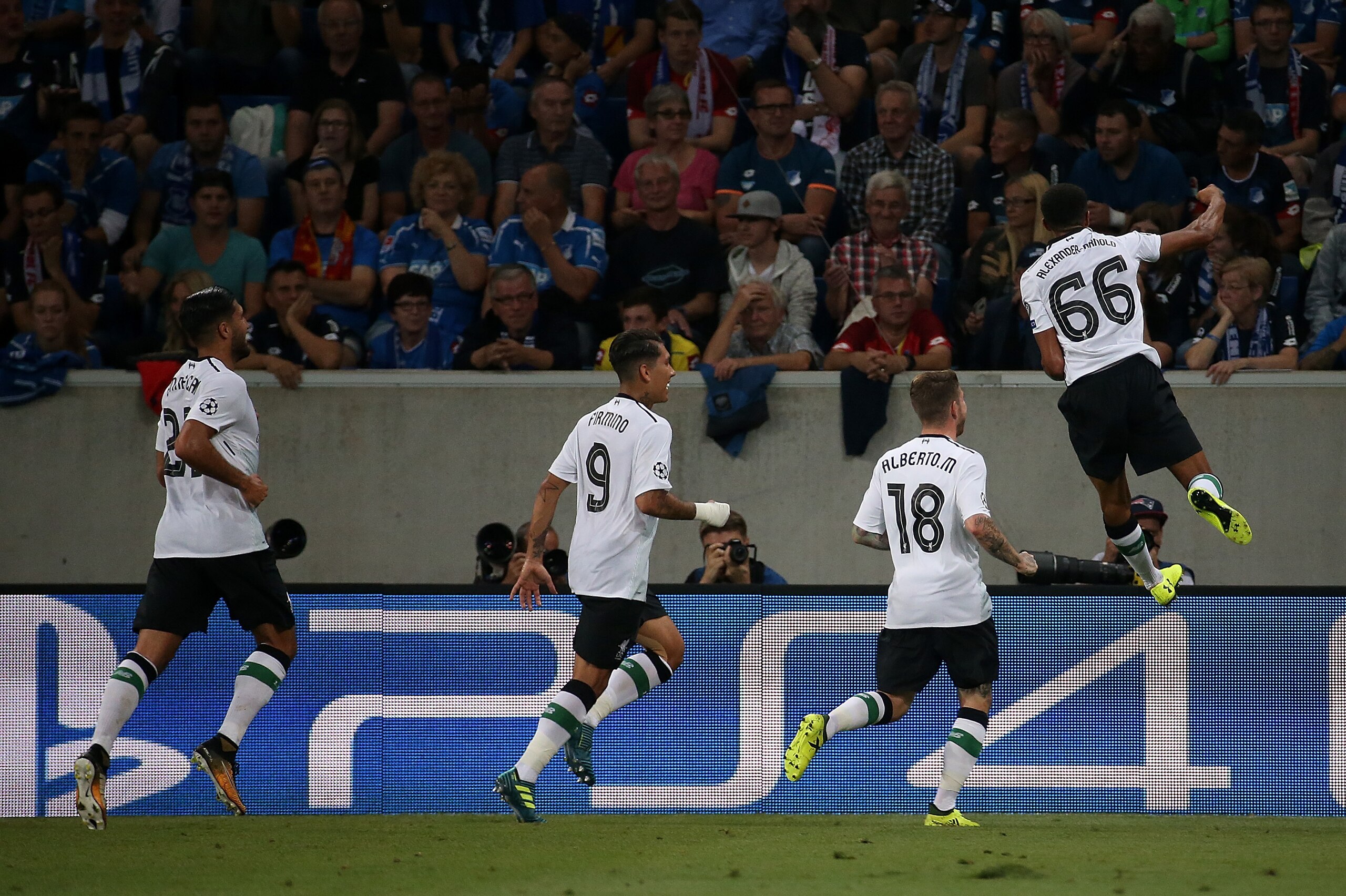 SINSHEIM, GERMANY - AUGUST 15: Trent Alexander-Arnold of Liverpool celebrates after scoring his team`s first goal during the UEFA Champions League Qualifying Play-Offs Round First Leg match between 1899 Hoffenheim and Liverpool FC at Wirsol Rhein-Neckar-A SINSHEIM, GERMANY - AUGUST 15: Trent Alexander-Arnold of Liverpool celebrates after scoring his team`s first goal during the UEFA Champions League Qualifying Play-Offs Round First Leg match between 1899 Hoffenheim and Liverpool FC at Wirsol Rhein-Neckar-A