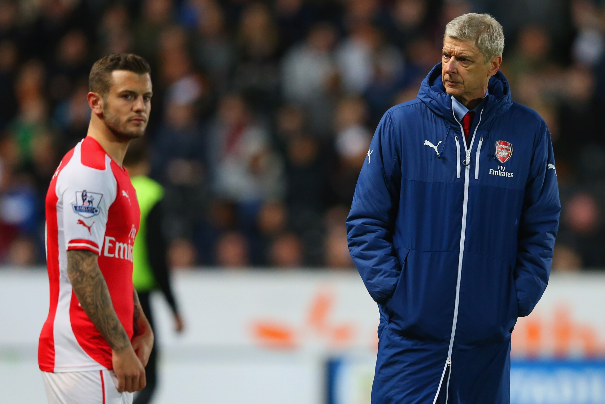 HULL, ENGLAND - MAY 04:  Arsene Wenger manager of Arsenal looks on as Jack Wilshere of Arsenal prepares to come onto the pitch during the Barclays Premier League match between Hull City and Arsenal at KC Stadium on May 4, 2015 in Hull, England.  (Photo by