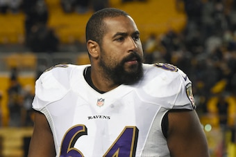 PITTSBURGH, PA - NOVEMBER 2:  Offensive lineman John Urschel #64 of the Baltimore Ravens looks on from the field after a game against the Pittsburgh Steelers at Heinz Field on November 2, 2014 in Pittsburgh, Pennsylvania.  The Steelers defeated the Ravens
