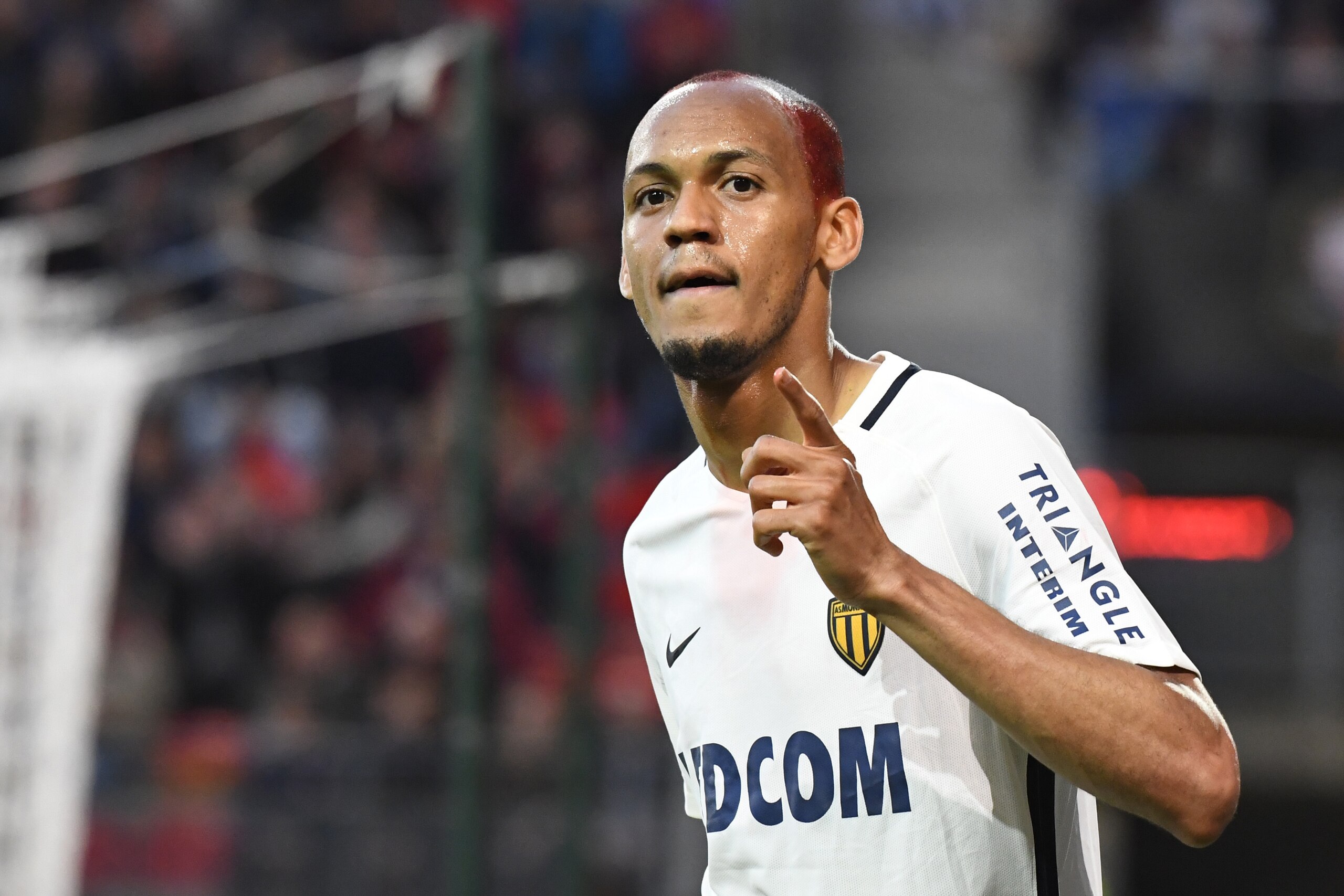 Monaco's Brazilian defender Fabinho celebrates after scoring during  the French L1 football match between Rennes (SRFC) and Monaco (ASM) on May, 20 2017, at the Roazhon Park stadium in Rennes, western France. / AFP PHOTO / DAMIEN MEYER        (Photo credi