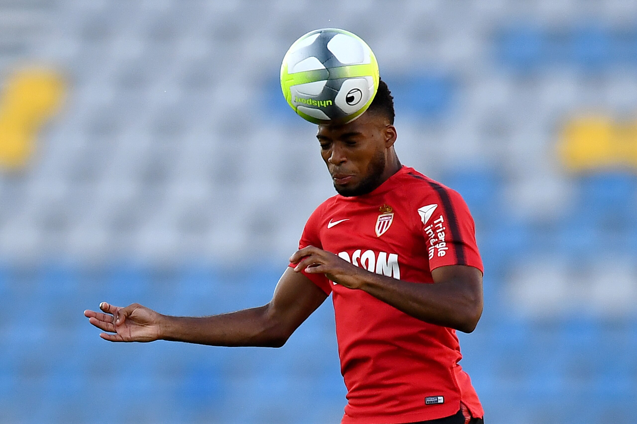 Monaco's French midfielder Thomas Lemar heads the ball during a training session at the Grand Stade in Tangiers on July 28, 2017 on the eve of the French Trophy of Champions (Trophee des Champions) football match between Paris Saint-Germain and Monaco. / 