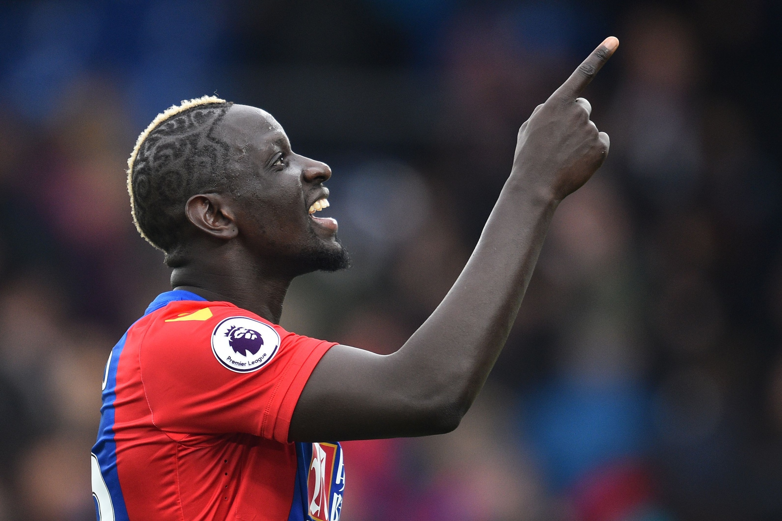 Crystal Palace's French midfielder Mamadou Sakho gestures as he celebrates on the pitch after the English Premier League football match between Crystal Palace and Watford at Selhurst Park in south London on March 18, 2017.
Crystal Palace won the game 1-0.