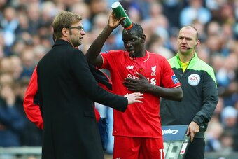 LONDON, ENGLAND - FEBRUARY 28:  Jurgen Klopp, manager of Liverpool talks to an injured Mamadou Sakho during the Capital One Cup Final match between Liverpool and Manchester City at Wembley Stadium on February 28, 2016 in London, England.  (Photo by Clive 
