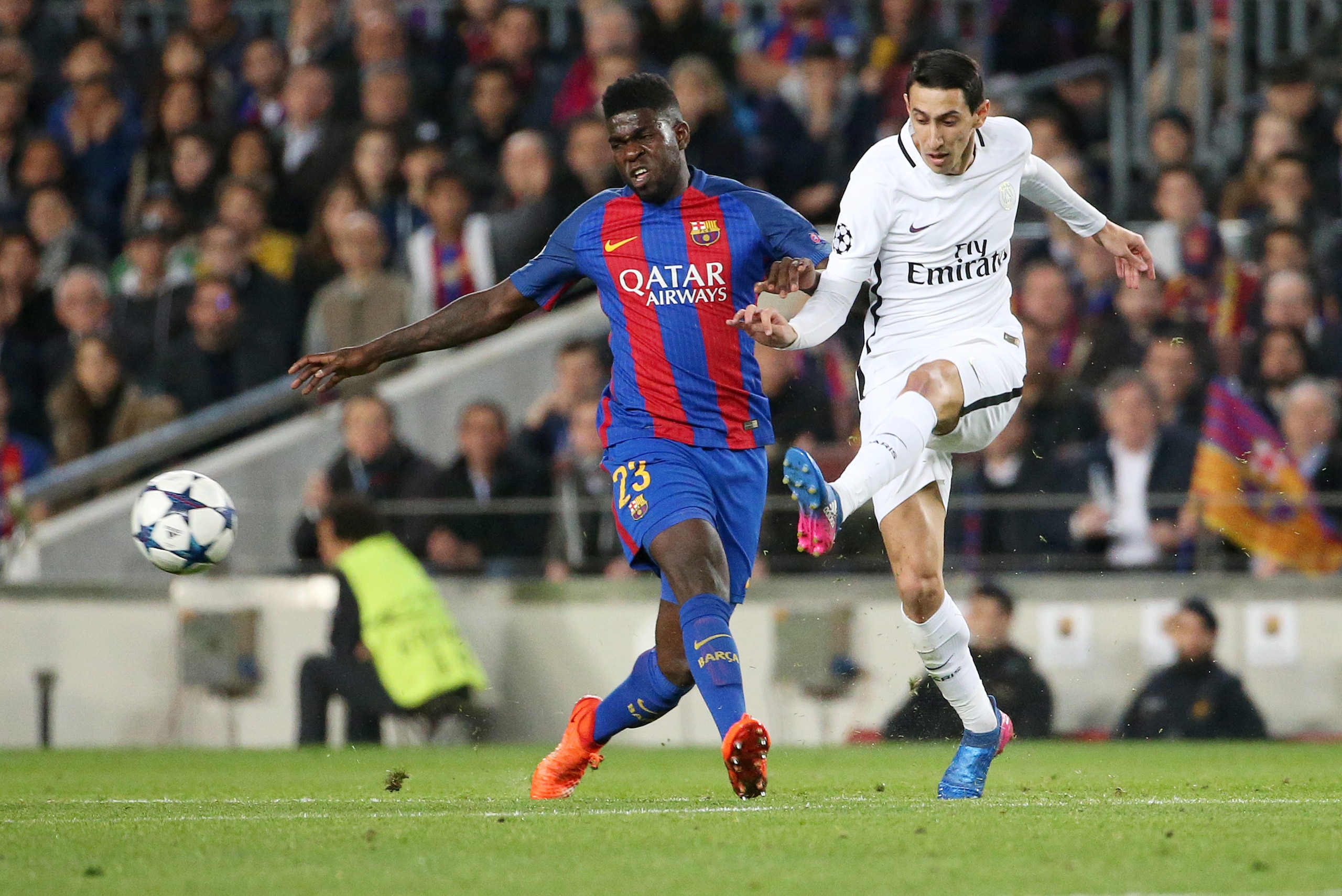 BARCELONA, SPAIN - MARCH 8: Samuel Umtiti of FC Barcelona and Angel Di Maria of PSG in action during the UEFA Champions League Round of 16 second leg match between FC Barcelona and Paris Saint-Germain (PSG) at Camp Nou on March 8, 2017 in Barcelona, Spain