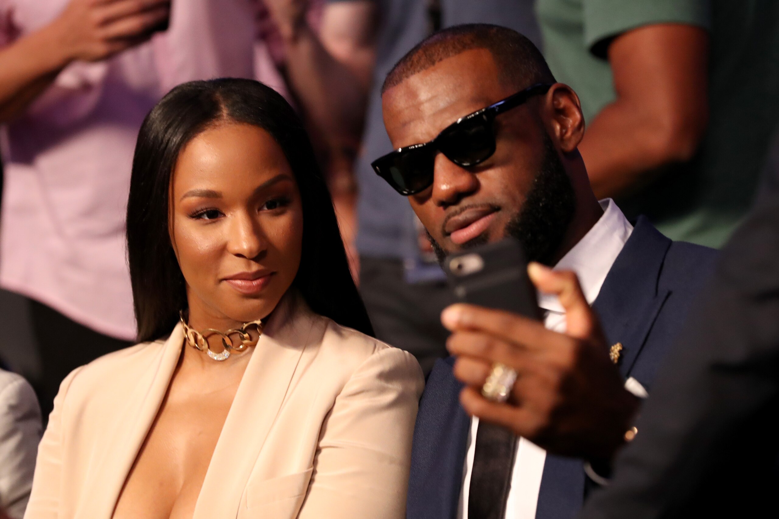 LAS VEGAS, NV - AUGUST 26:  NBA player Lebron James and wife Savannah Brinson attends the super welterweight boxing match between Floyd Mayweather Jr. and Conor McGregor on August 26, 2017 at T-Mobile Arena in Las Vegas, Nevada.  (Photo by Christian Peter