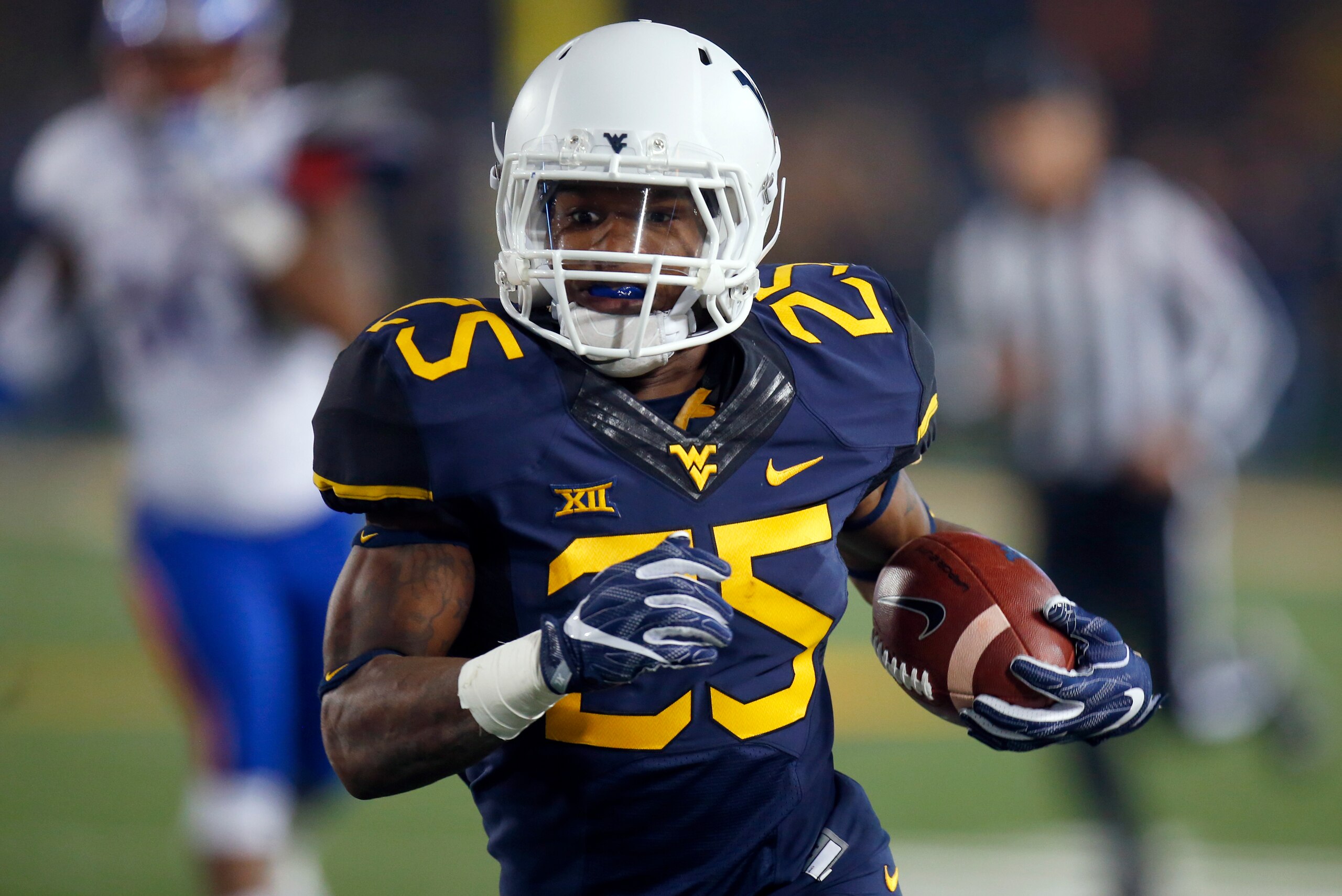 MORGANTOWN, WV - NOVEMBER 05:  Justin Crawford #25 of the West Virginia Mountaineers in action against the Kansas Jayhawks at Mountaineer Field on November 5, 2016 in Morgantown, West Virginia.  (Photo by Justin K. Aller/Getty Images)