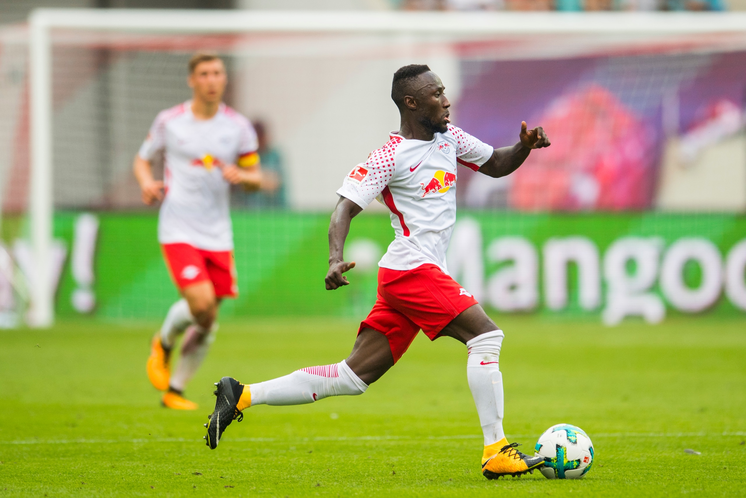 Leipzig's Guinean midfielder Naby Deco Keita plays the ball during the German first division Bundesliga football match between RB Leipzig and SC Freiburg in Leipzig, eastern Germany on August 27, 2017.  / AFP PHOTO / ROBERT MICHAEL        (Photo credit sh