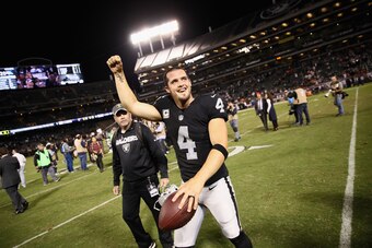 "He wants to go down as the best quarterback to play," Raiders offensive coordinator Todd Downing says.